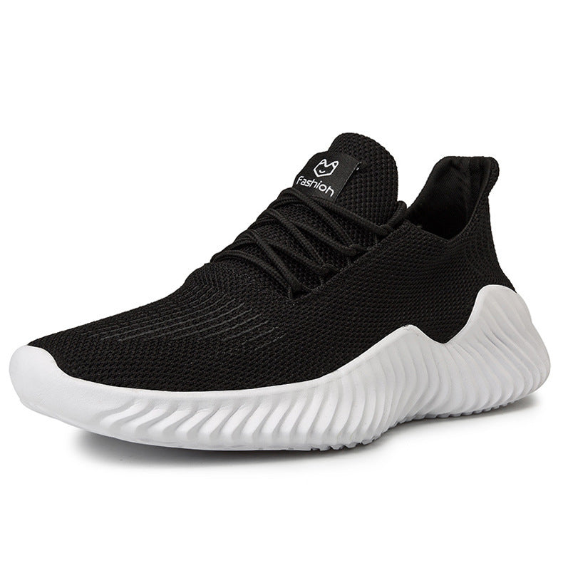 Black sneaker with white sole on a white background