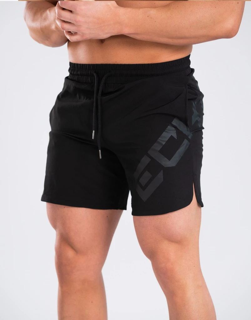 Black shorts with a brand logo on a white background
