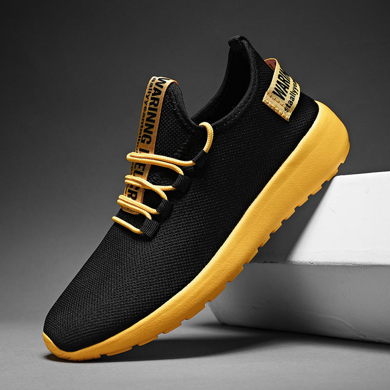 Black and yellow sneaker with 'Warining' branding on a gray background