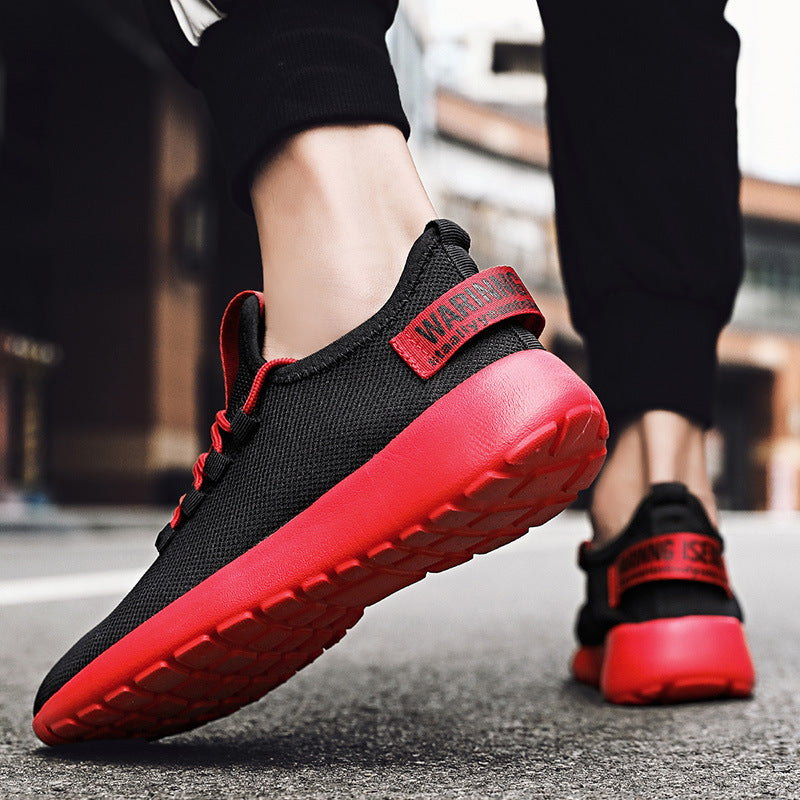 Black and red running shoes on a blurred background
