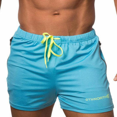 Blue shorts with yellow drawstring on a white background