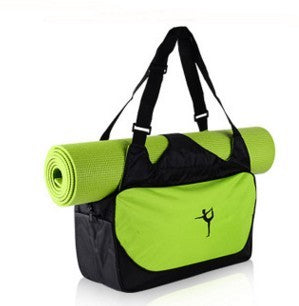 Green and black bag with a yoga mat on a white background