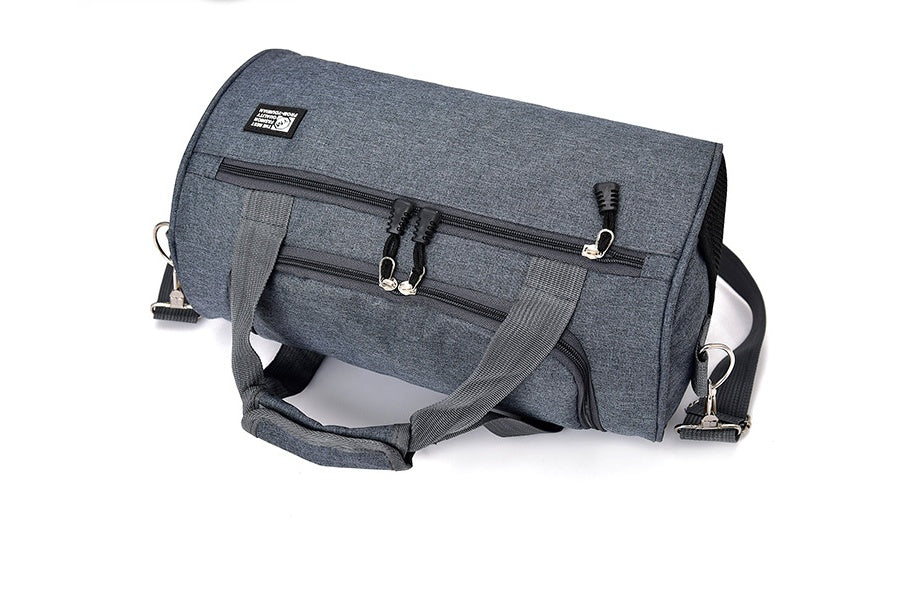 Gray duffel bag with zippers on a white background