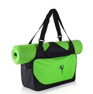 Green and black bag with a yoga mat on a white background