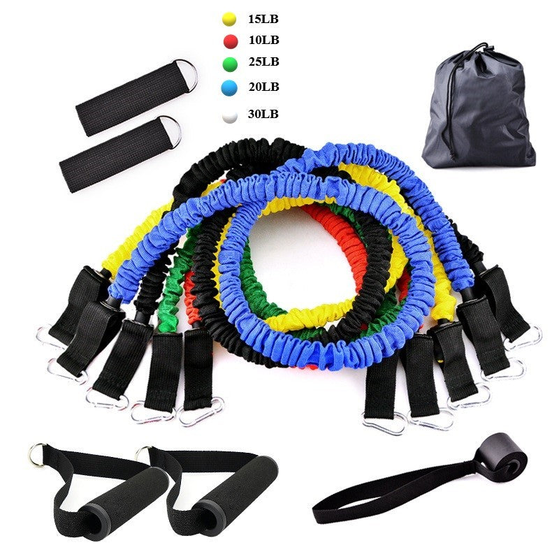 Set of resistance bands in various colors with carrying bag on a white background