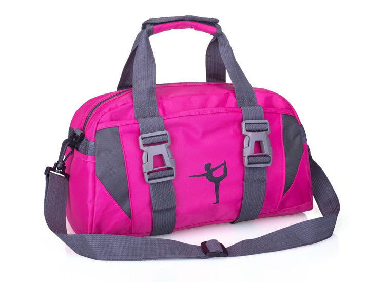 Pink duffel bag with gray straps on a white background
