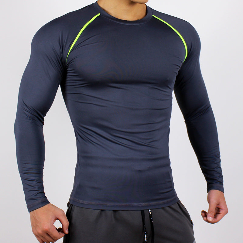 Navy long-sleeve athletic shirt with green accents on a plain background