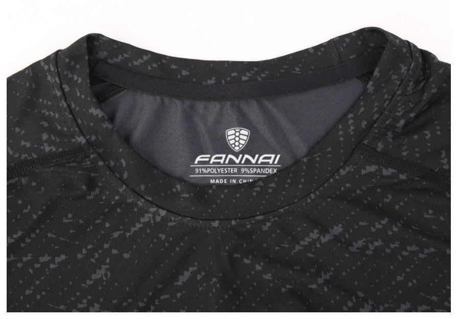 Black patterned shirt with Fannai logo on a white background