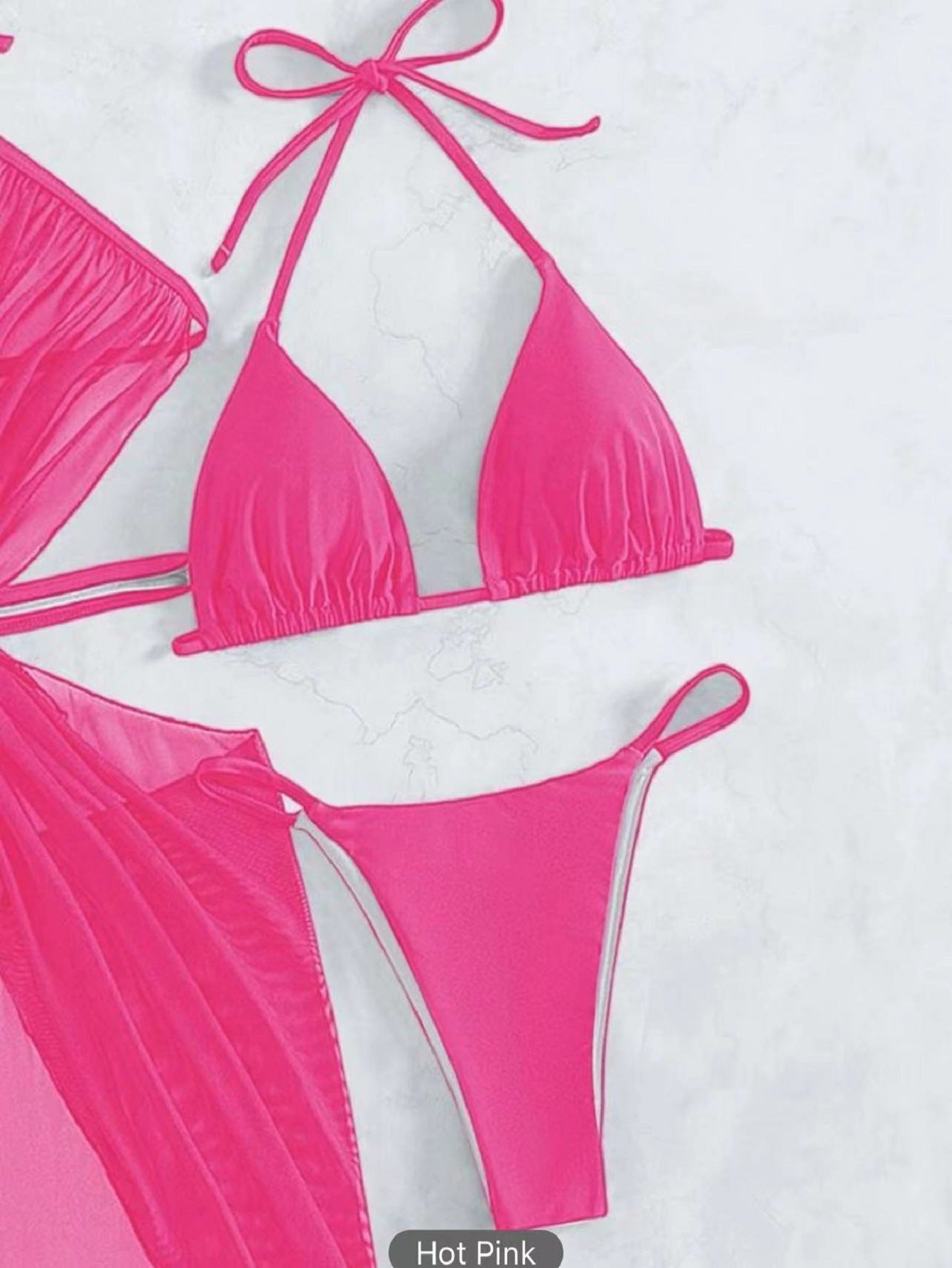 Hot pink bikini set on a white background