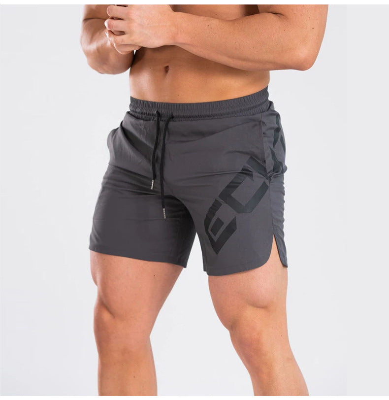Gray athletic shorts with a brand logo on a white background