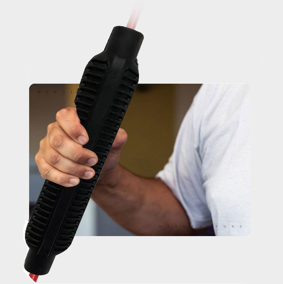 Person holding a black textured object with a white background