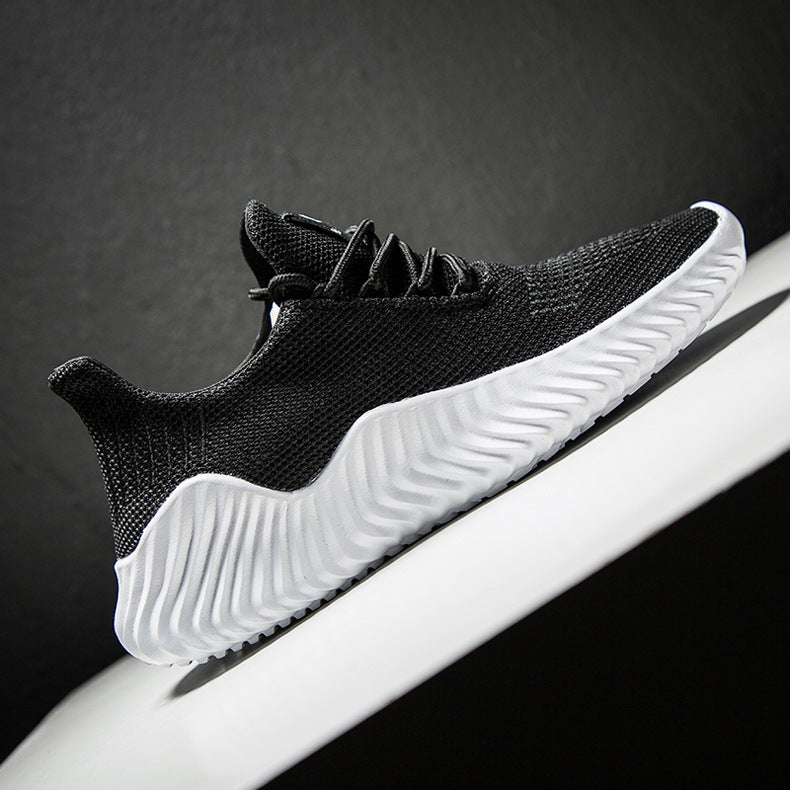 Black and white sneaker on a dark background