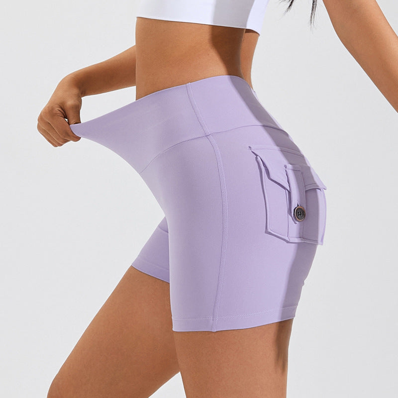 Lavender athletic shorts worn by a person on a white background