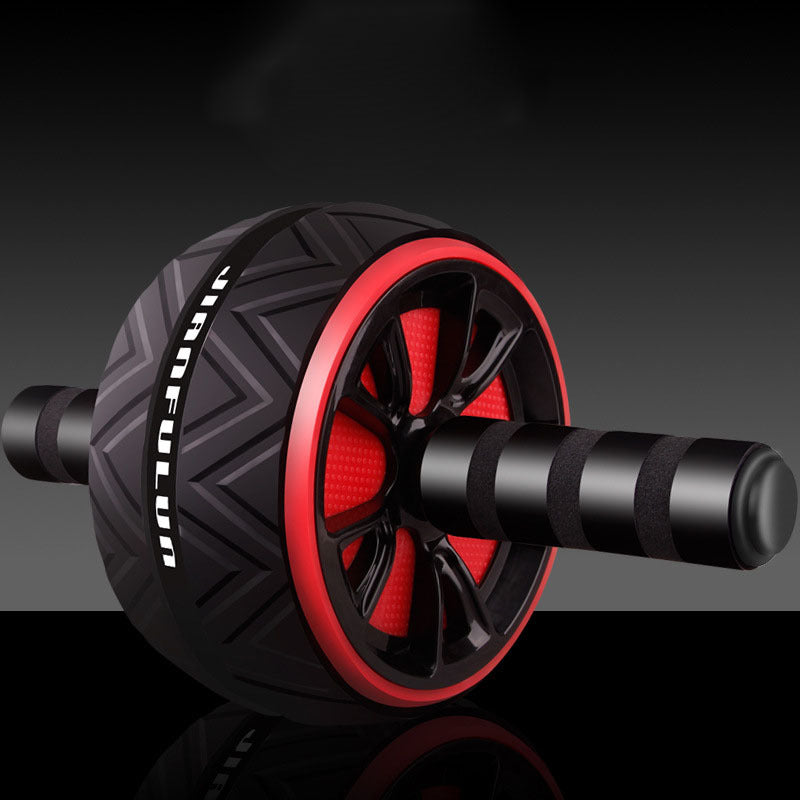 Black and red ab roller on a dark background