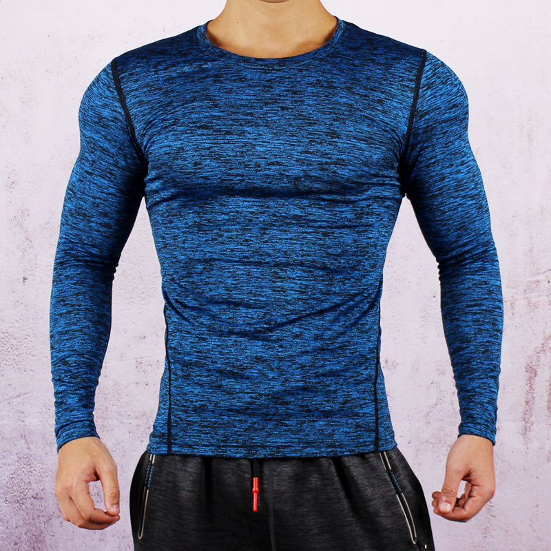 Blue long-sleeve athletic shirt worn by a person on a light gray background