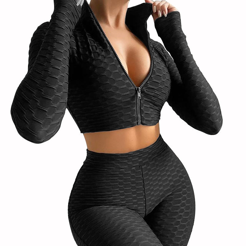 Black textured athletic jacket and leggings set on a white background