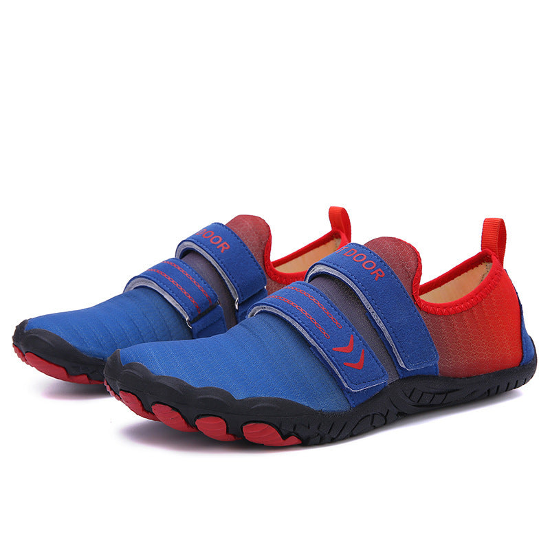 Blue and red water shoes with velcro straps on a white background