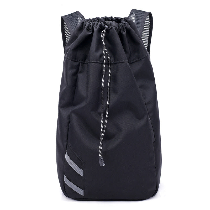 Black drawstring bag with mesh side panels on a white background