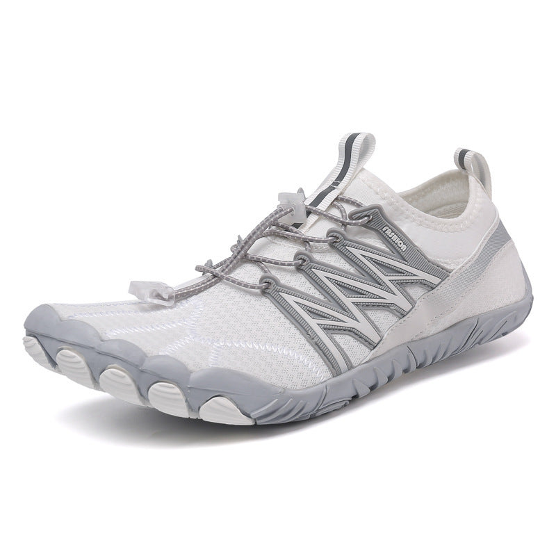 White and gray athletic shoe on a white background