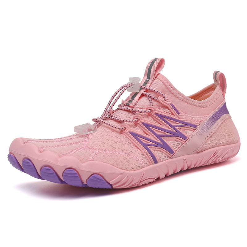 Pink and purple athletic shoe on a white background